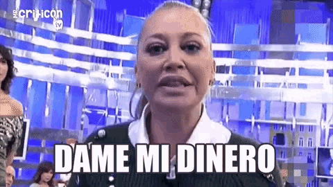 a woman is standing in front of a blue wall and says dame mi dinero .