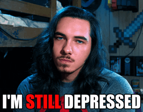 a man with long hair and a beard says i 'm still depressed in red letters