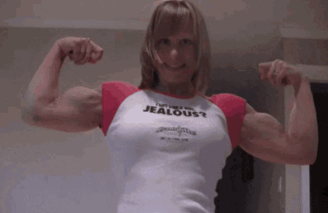 a woman wearing a shirt that says i 'm not jealous