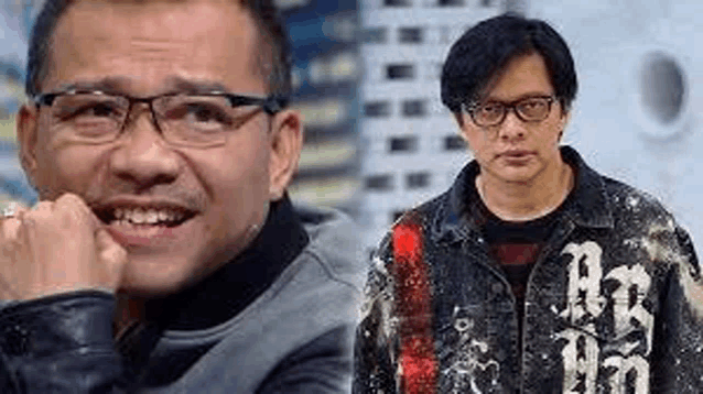 a man wearing glasses and a denim jacket is standing next to another man wearing glasses .