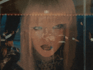 a painting of a woman with long blonde hair and a leopard print dress