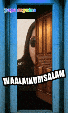 a picture of a woman wearing sunglasses and a sign that says waalaikumsalam