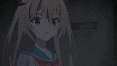 a girl in a school uniform is crying with a sign in the background