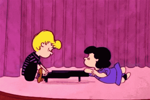 a cartoon of a boy and a girl playing a piano together .