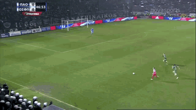 a soccer game is being played in front of a banner that says " # there will be haters "