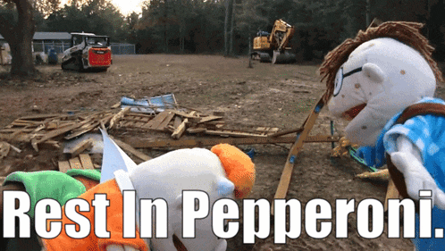 two stuffed animals are standing in a field with the words rest in pepperoni on the bottom