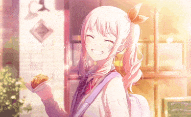 a girl with pink hair is smiling and holding a sandwich