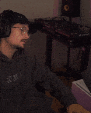 a person is wearing a sweatshirt with a flower on the back