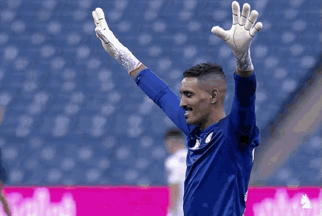 a soccer player in a blue jersey with the number 9 on it
