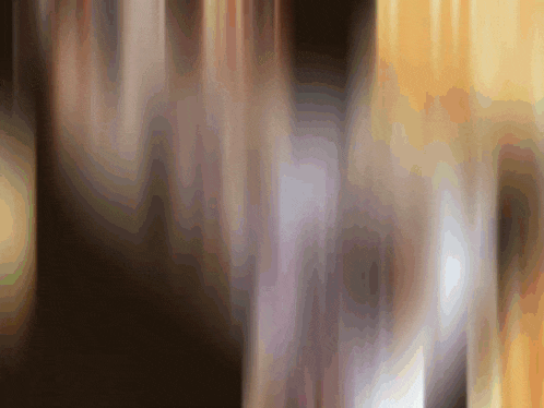a blurred image of a dark background with a few lines of light