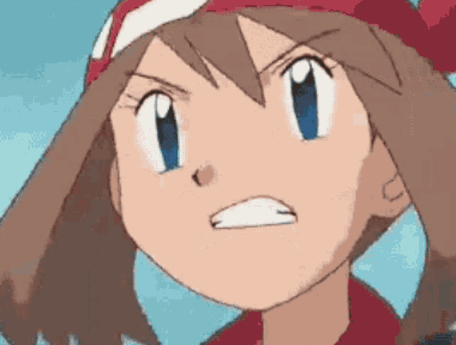 a close up of a cartoon character 's face with an angry expression .