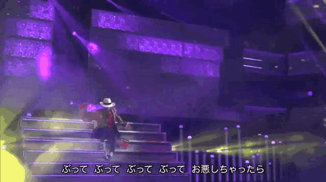a man in a cowboy hat is standing on a stage with a bunch of money falling around him