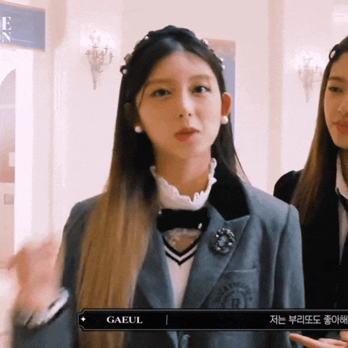 a girl in a school uniform with the name gaeul on the bottom