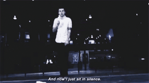a man is jumping in the air with the words " and now i just sit in silence " next to him