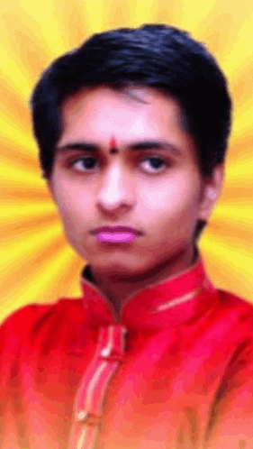 a young man wearing a red shirt with a yellow background