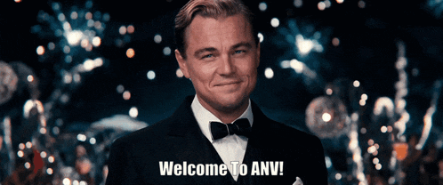 a man in a tuxedo with the words welcome to anv