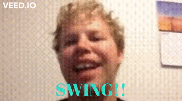 a man is smiling in front of a wall with the words swing written on it