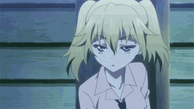 a girl with blonde hair and blue eyes is leaning on a pole