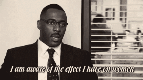 a man in a suit and tie is talking about the effect he has on women .
