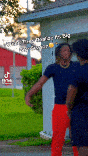 two men are standing in front of a building with the caption when they realize its big boy season ..