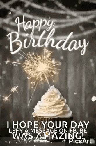 a cupcake with whipped cream and a sparkler on top of it .