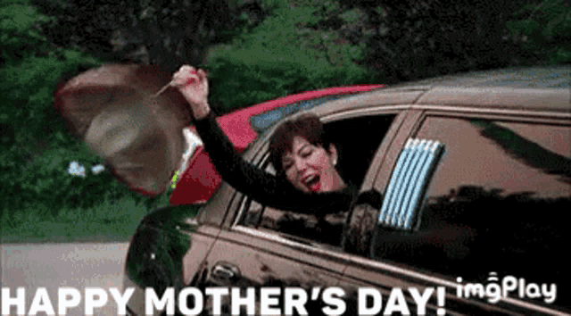 a woman is sitting in a limousine with her arms in the air and the words happy mother 's day