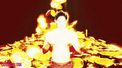 a man standing in front of a pile of gold coins with cosmopolitan written on the bottom left