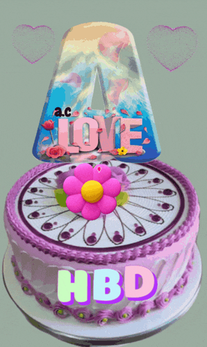 a birthday cake with the letter a on top