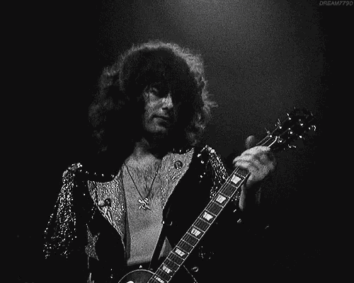 a man is playing a guitar in a black and white photo with the hashtag dream7790