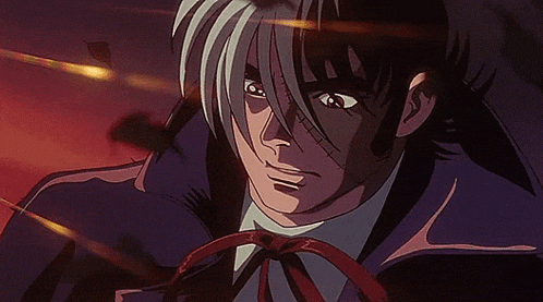 a close up of a cartoon character 's face with a red ribbon around his neck