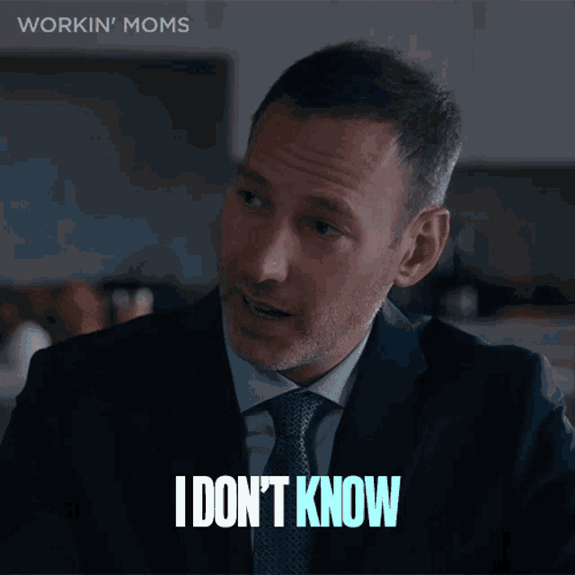 a man in a suit and tie says " i don t know "