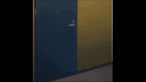 a fox anime character is standing in front of a door .