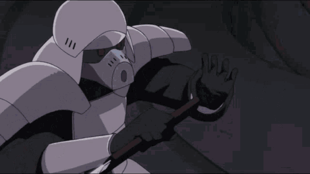 a group of robots with horns are standing next to each other .