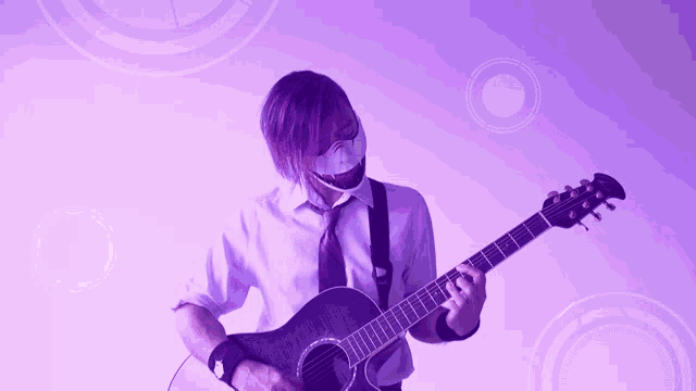 a man with purple hair is playing a guitar