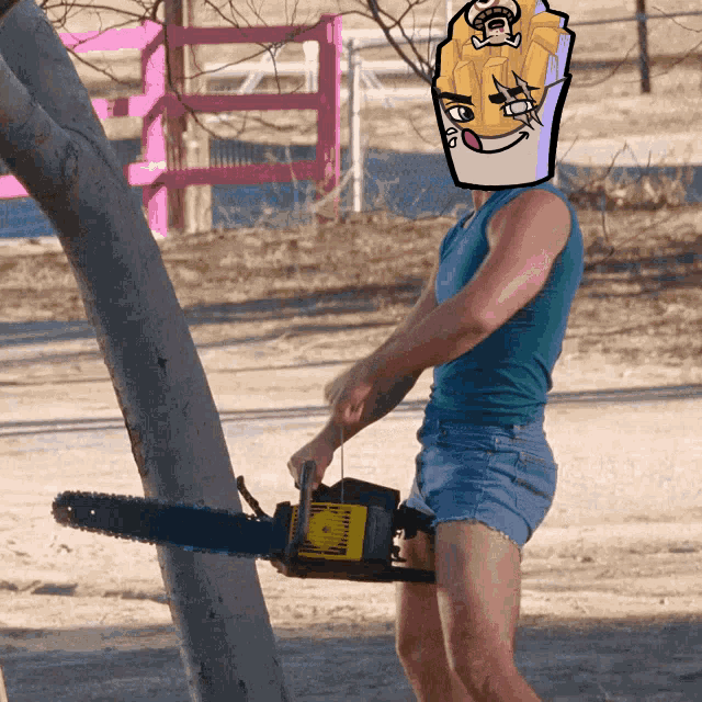 a man holding a chainsaw with a cartoon face on his face