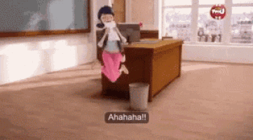 a cartoon character is jumping in the air in a classroom while sitting at a desk .
