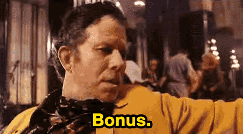 a man wearing a yellow jacket and a scarf says bonus .