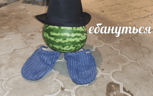 a watermelon wearing a top hat and blue slippers is standing on a tiled floor