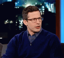 Confused GIF - Awkward Laughter Andy Samberg Laughing GIFs