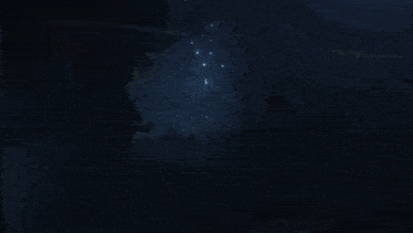 a girl with a crown on her head is sitting in a dark room