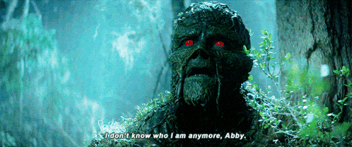 a swamp creature with red eyes says " i don t know who i am anymore abby "
