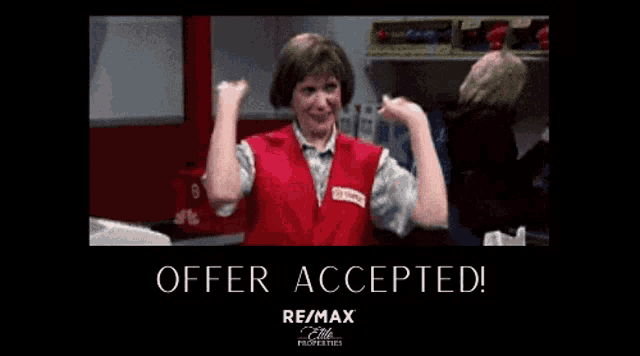 a woman in a red vest with the word offer accepted on the bottom