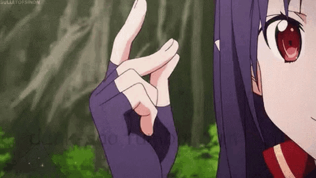 a girl with red eyes is making a peace sign with her hands .