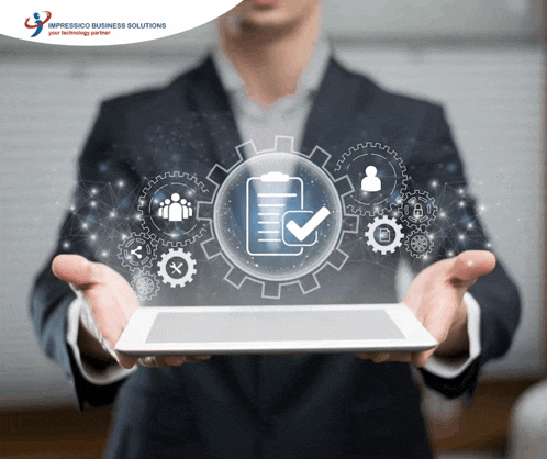 a man in a suit holds a tablet with a check mark in the middle