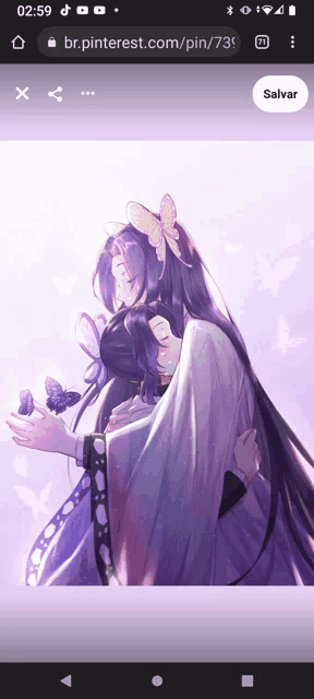 a phone screen shows a picture of a girl holding a butterfly