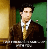 a man in a suit and tie is breaking up with a woman .