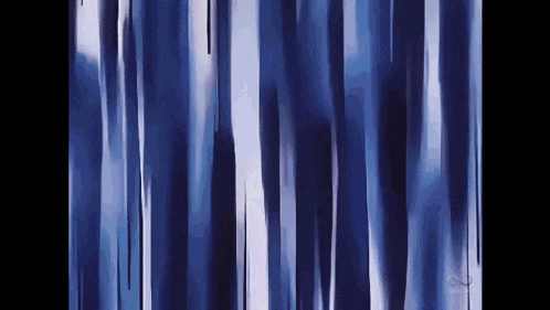 a close up of a blue curtain with a blurred background