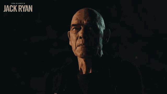 a movie poster for tom clancy 's jack ryan shows a bald man