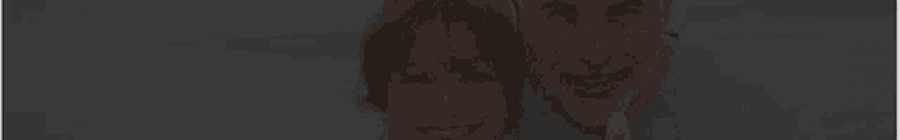 a woman is holding her head with her eyes closed
