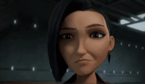 a close up of a cartoon character 's face with an angry look on her face